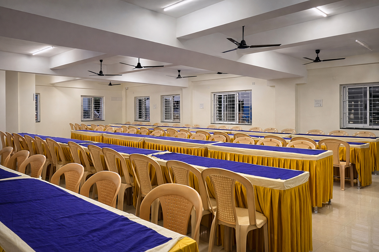 Event hall with tables and seating at VJK Mahal mini hall Pallavaram Chennai
